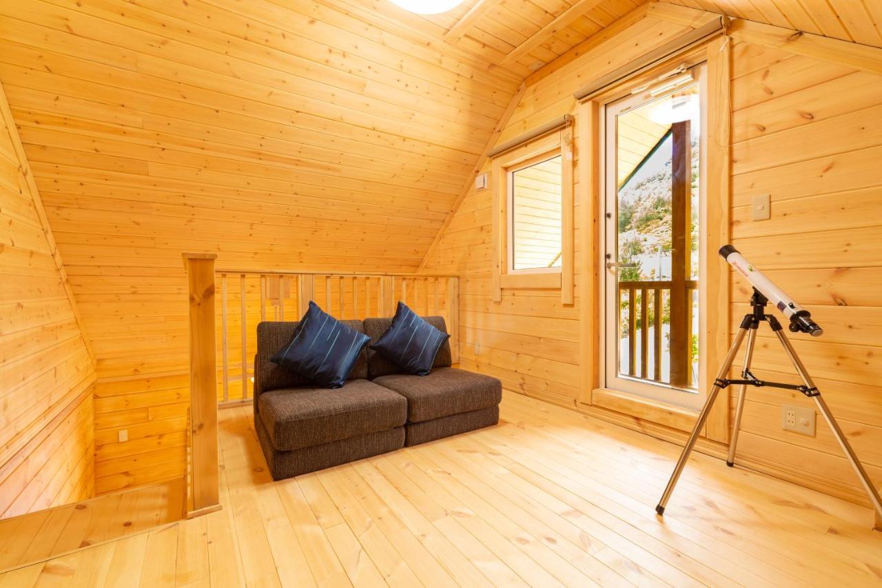 レジーナ石垣　ログテリアⅰ Ferienhaus